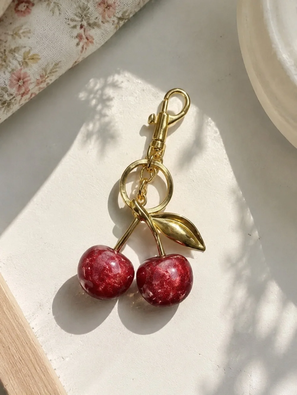 Coach Gold-tone Cherry Keychain with Red Lucite Cherries